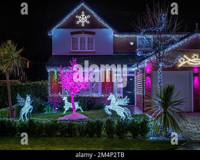 Eastchurch, Kent, UK. 22nd Dec, 2022. Kingsborough Manor estate in Eastchurch, Kent on the Isle of Sheppey goes 'all out' for Christmas with most of the properties in the area being decorated with amazing Christmas lights displays. Credit: James Bell/Alamy Live News Stock Photo