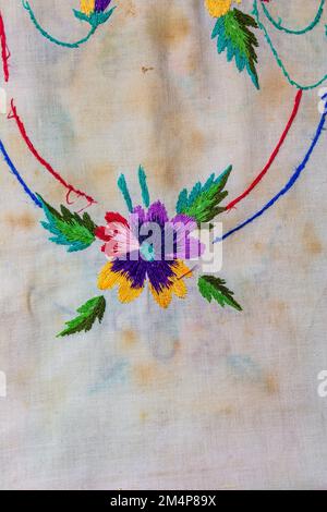 Towel with Ukrainian ethnic ornament, well embroidered with satin stitch, close-up Stock Photo