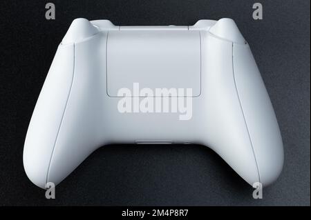 Wireless game controller back view isolated on black background Stock Photo