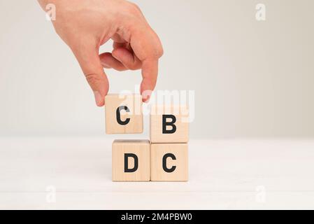 Wooden cube block, CBDC concept. Central bank digital currency technology. Stock Photo