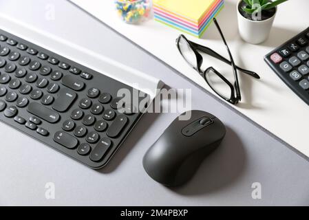 Wireless computer mouse and keyboard. Workspace at the office Stock Photo