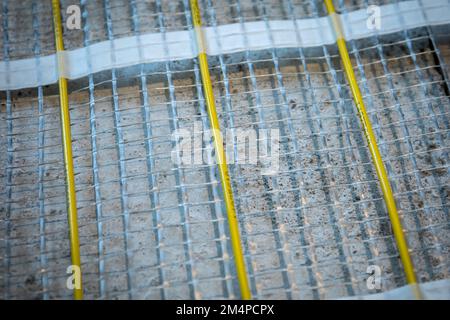 Heating cable for warm floor close-up detail. Stock Photo