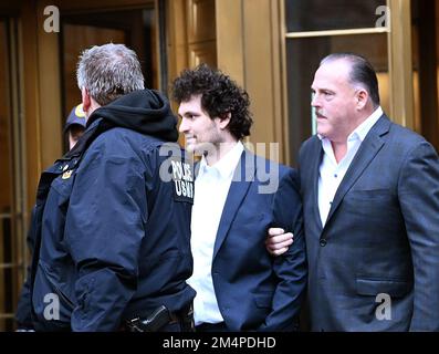 New York, USA. 22nd Dec, 2022. Sam Bankman-Fried founder and chief executive officer of FTX leaves federal court in Manhattan, Thursday, December 22, 2022 in New York. Bankman was released on 250 million dollars bail and was fitted with an ankle bracelet while awaiting trial for fraud and other criminal charges, Photo by Louis Lanzano/ Credit: UPI/Alamy Live News Stock Photo