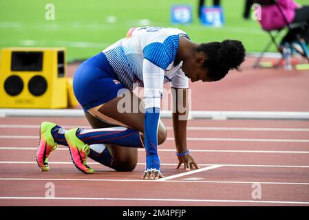 Runner in on your marks position before 100m race on an athletics track,  UK Stock Photo - Alamy