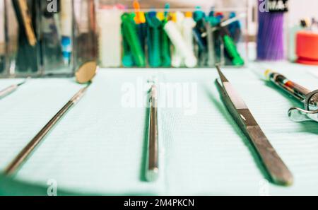 Stomatologist tools close-up on table. Set of dental tools on dentist's panel. Close up of dental tools on dentist's table, Dentist tools on the table Stock Photo