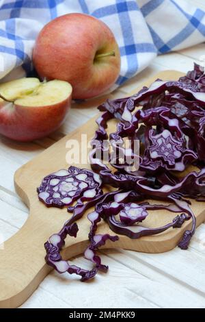 Red cabbage, sliced red cabbage and apples Stock Photo