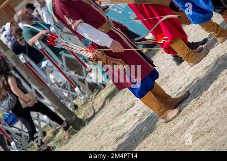 Old style wooden arrows in the case of an archer Stock Photo