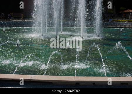 A water fountain sprinkling water in the view Stock Photo