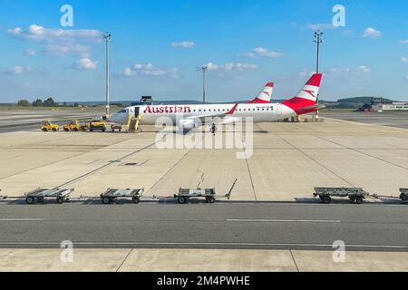 Aircraft Passenger aircraft Jets Jets of Austrian Airlines stand parked in parking position on flight apron of Vienna-Schwechat Vienna International Stock Photo