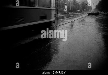 GDR, Berlin, 29. 04. 1989, Oranienburger Strasse in the rain, tramway Stock Photo
