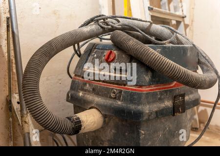 professional construction vacuum cleaner used during the renovation Stock Photo