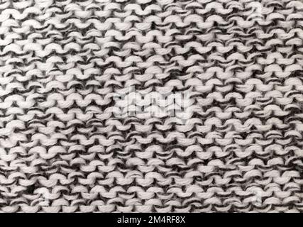 grey knitted background, top view Stock Photo