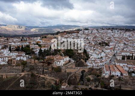 Rocky landscape of Ronda city with Puente Nuevo Bridge and buildings, Andalusia, Spain Stock Photo