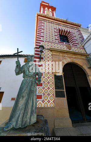 Ronda, Spain - Dec 1, 2021: The statue of Fray Diego Jose de Cadiz, located in front of Iglesia de Nuestra Senora de La Paz, in Ronda. His bones are i Stock Photo