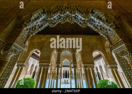 Granada, Spain - Nov 29, 2021: Courtyard of the Lions in the Alhambra palace - masterpiece of moorish architecture (14th century). Stock Photo