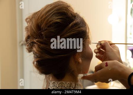 Look here. Styling curly hair. Hairdresser tip. Kid girl long