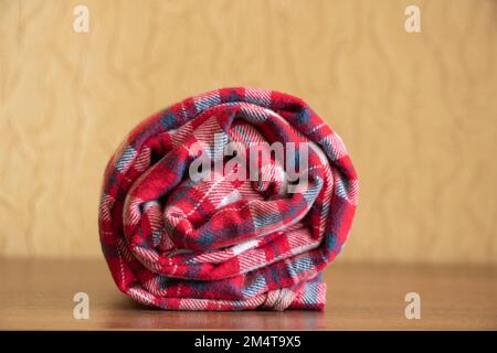 twisted home pants in a cage on the shelves Stock Photo