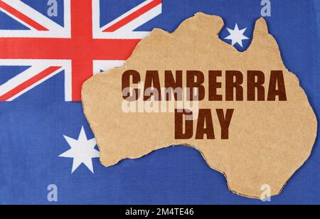 National concept of Australia. On the flag of Australia lies the contour of the map of the country with the inscription - Canberra Day Stock Photo