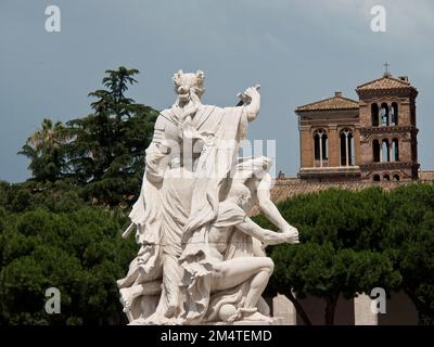 A rear view of the law statue at the Altar of the Fatherland with Saint Marco Basilica in the background Stock Photo