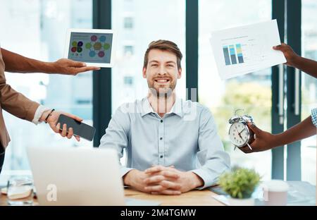 Pressure doesnt get to me. a young businessman looking calm in a demanding office environment. Stock Photo