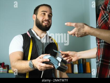 Customer paying with credit card  Stock Photo