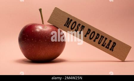 The word most popular. Written on wooden frame. Studio shoot Stock Photo