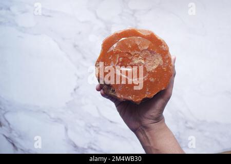 Jaggery traditional cane sugar cube on table  Stock Photo