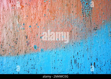 old wooden plank wall with old faded peeling green, yellow paint Stock Photo