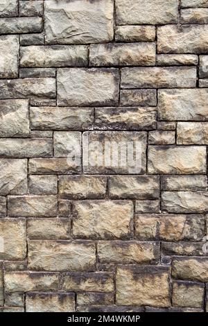Old dressed stone industrial building wall full frame texture background Stock Photo
