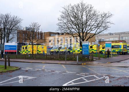 Southend on Sea, Essex, UK. 23rd Dec, 2022. Despite the opening of an Ambulance Handover Unit at Southend University Hospital large numbers of ambulances continue to queue outside waiting to deliver their patients inside. Opened in November the unit has space for up to 12 patients and is designed to help reduce patient handover delays Stock Photo