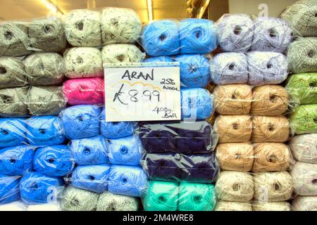 Arran wool balls of wool in shop window photographed from the street Stock Photo