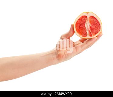 sliced grapefruit in hand path isolated on white Stock Photo