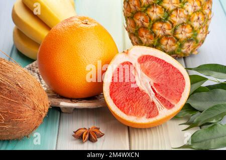 sliced grapefruit on wood background Stock Photo