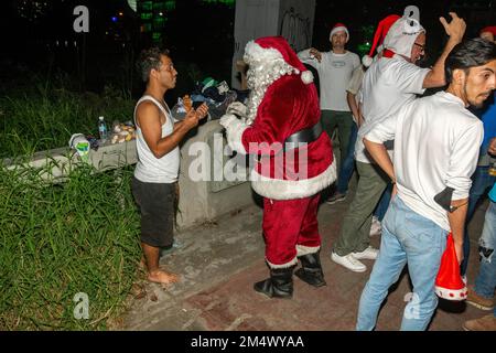 Santa in the streets (Santa en las calles), after 2 years of not being able to celebrate this solidarity project that provides moments of happiness to Stock Photo