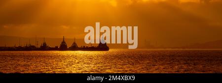 UK, Scotland, Panoramic view of Shetland Gas Plant and Sullom Voe Terminal at moody dusk Stock Photo