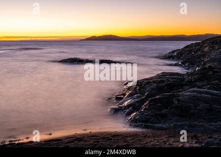 Lake Superior shoreline at dusk, Rock Island Lodge, Wawa, Ontario, Canada Stock Photo