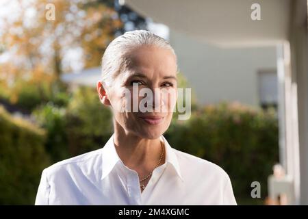 Confident senior woman with gray hair Stock Photo