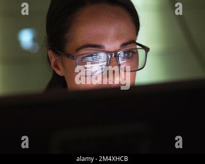 Computer programmer looking at codes Stock Photo