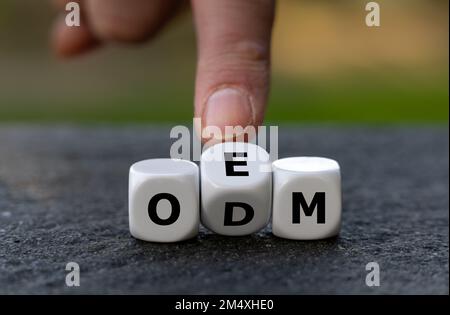 Dice form the abbreviation ODM (Original Design Manufacturer) and OEM (Original Equipment Manufacturer). Stock Photo