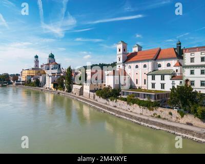 Germany, Bavaria, Passau, Aerial view of Inn river and St. Michaels Church in summer Stock Photo