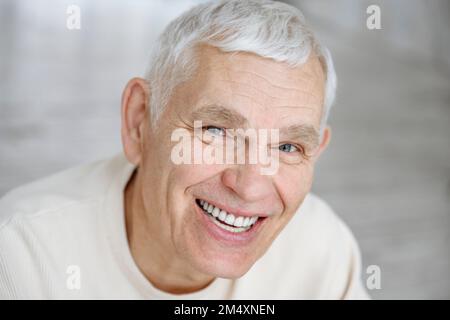 Happy senior man with white hair Stock Photo