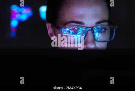 Engineer designing AI technology with reflection on eyeglasses Stock Photo