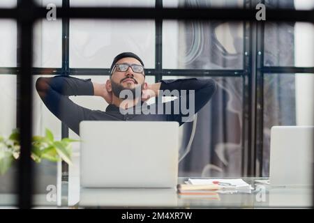 Businessman working on a laptop computer in the office Stock Photo