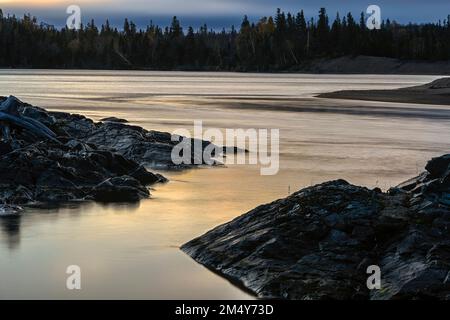 Dawn skies over the Michipicoten River, Rock Island Lodge, Wawa, Ontario, Canada Stock Photo