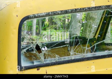 Cracked window on a junk yard truck, Door County, Wisconsin Stock Photo
