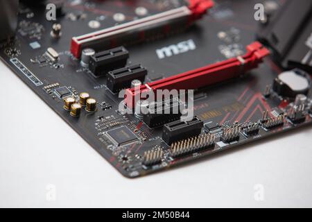 A Closeup of MSI in a computer motherboard isolated on a white background Stock Photo