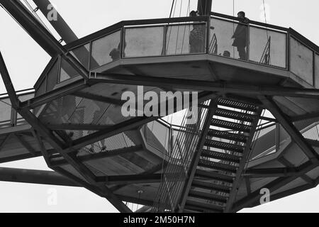 A grayscale of Tetrahedron, accessible viewing terrace Emscherblick in shape of a pyramid on slagheap Stock Photo