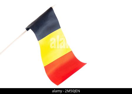 The flag of Belgium on a white background is developing and flying in the wind Stock Photo