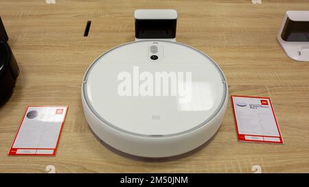 Robotic vacuum cleaner is sold at Xiaomi Mi store. Stock Photo