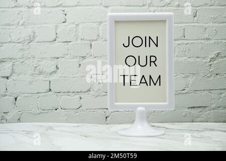 Join Our Team typography text on stand display Stock Photo